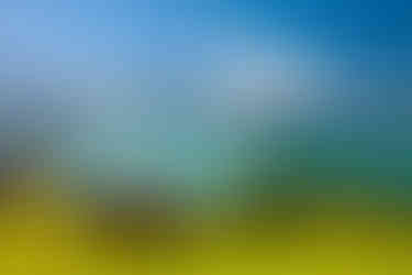 This image captures a scenic view of Lake Lucerne in Switzerland, featuring traditional Swiss chalets in the foreground.