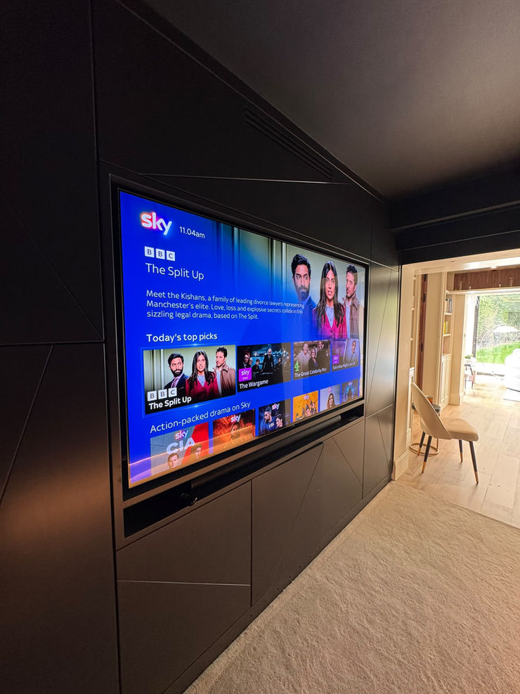 Modern minimalist living room integrated smart technology.