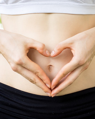 close-up-female-hands-shaping-heart-bell