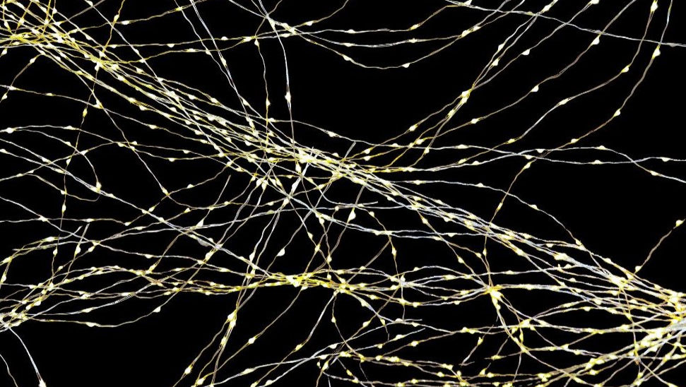 Abstract image of leight yellow nerves on a black background