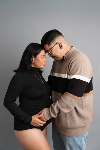 warm embrace, studio session 32 weeks pregnant
