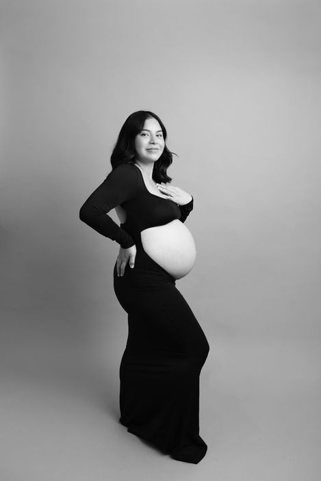classic, black and white maternity session in a studio setting