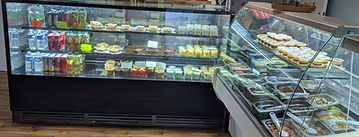 photo de la boutique  les savoureux avec les vitrines