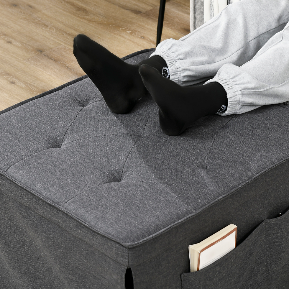 Miniaturbild: Charcoal grey ottoman from sleeper chair bed used as footrest