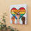 Thumbnail: LGBTQ Wall Clock with three fists in front of a rainbow heart