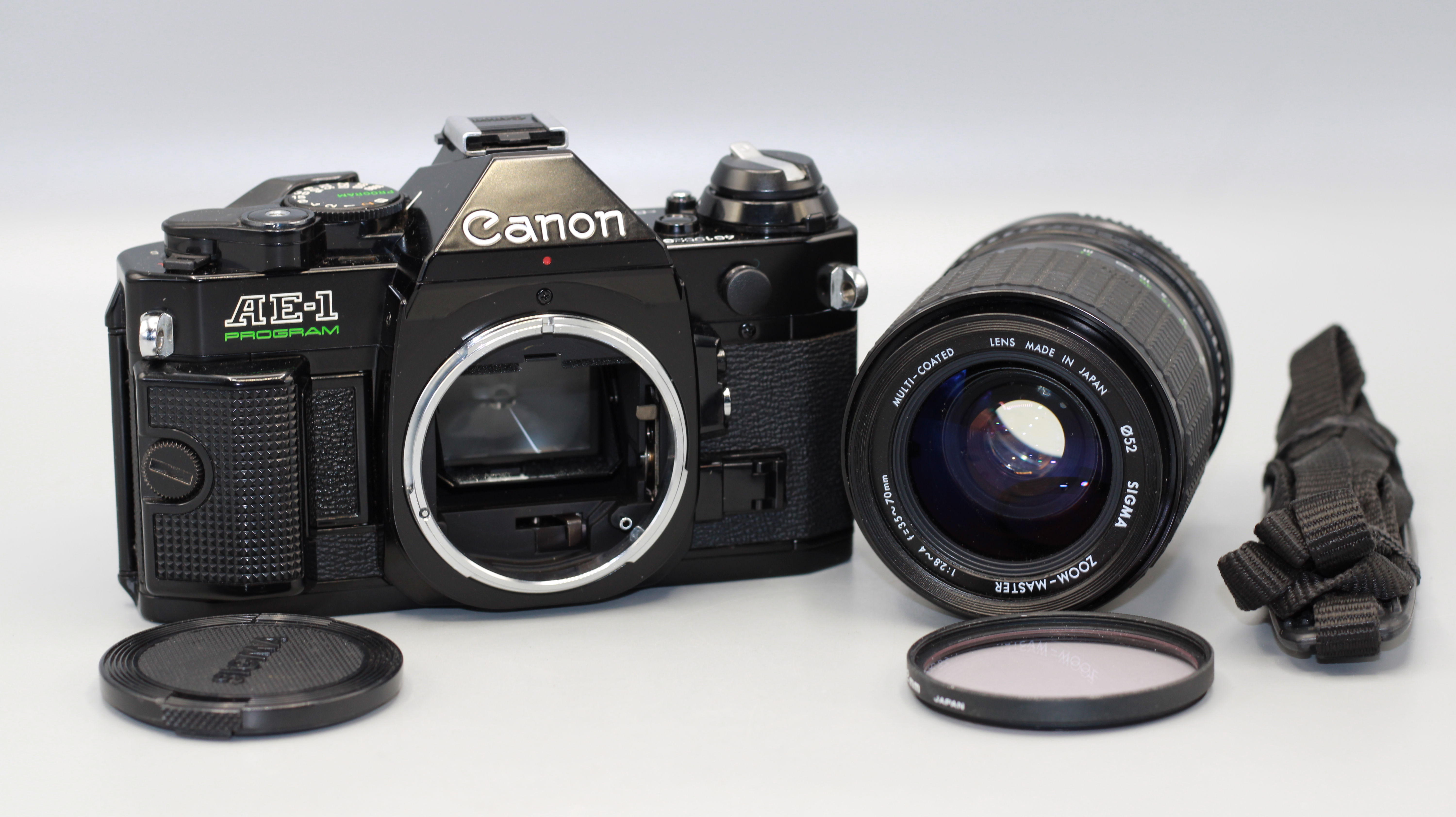 Canon AE-1 Program 35mm SLR Film Camera + Sigma 35-70mm f/2.8-4 Lens