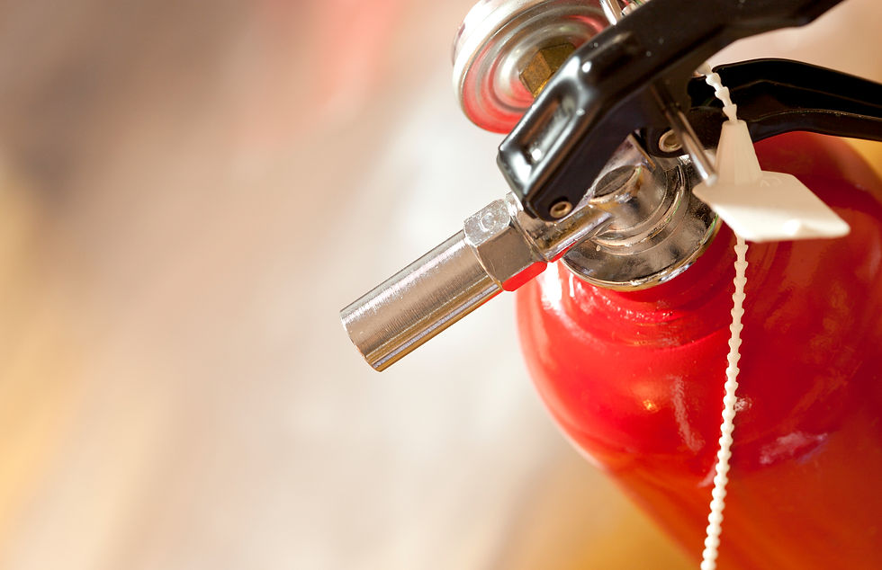 Red tank of fire extinguisher