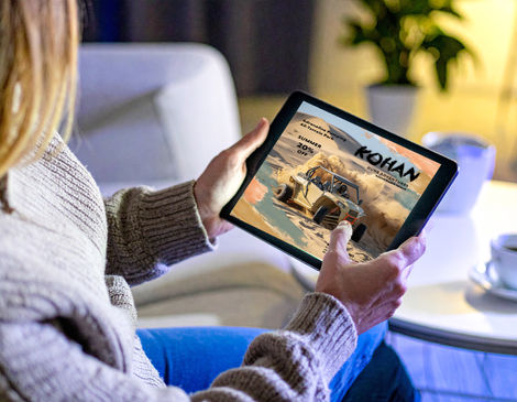 Image of an iphone, ipad in the hands of a female viewer