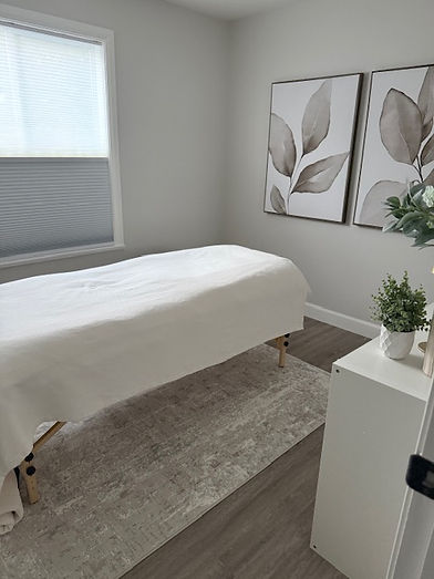 Calm and modern treatment room at The Skin Sanctuary in Nanaimo, designed for a relaxing skincare experience.
