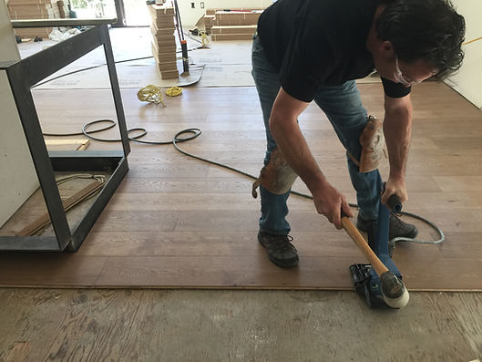 Commercial flooring installation including LVT and carpet systems in BC