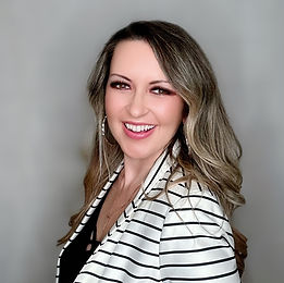 Crystal McGrath, Graphic Designer at Virtually There Services, professional headshot for branding and design