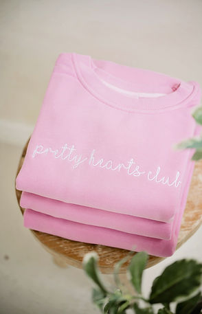 Pretty Hearts Club sweaters from Well Within Collective wellness shop