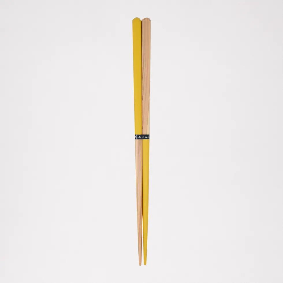 Thumbnail: A pair of yellow and natural wood, hashi bi-colour chopsticks, made by Style of Japan.