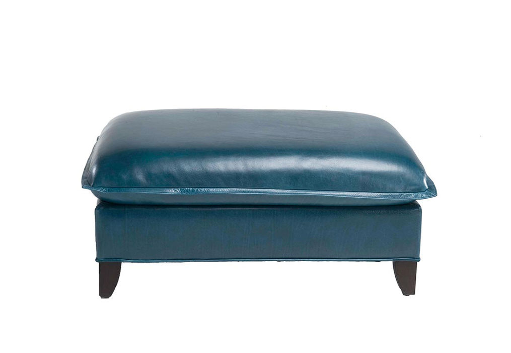 Plush cushioned ottoman with flange welt trim