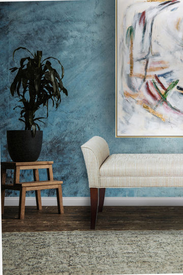 Traditional hallway bench with curved arms and wood legs in living space