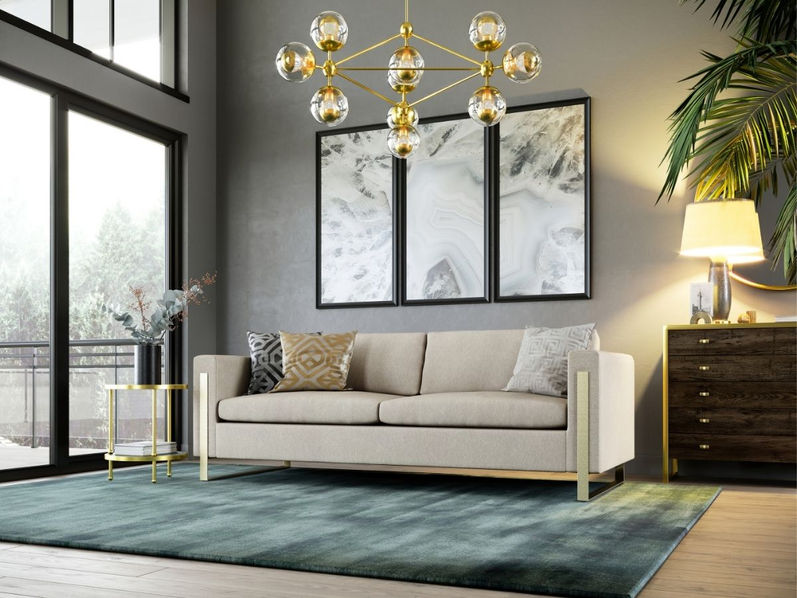 The Oslo Sofa with exposed metal arm detail in a modern living room