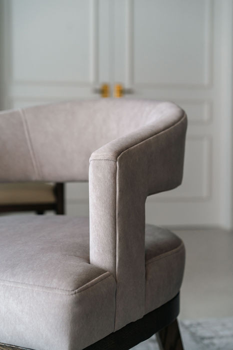 curved arm detail on the zayn chair made in Toronto, Canada from Vogel