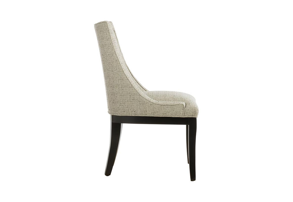 Side view of the 11181 Dior dining chair by Vogel made in Toronto, ON and allows you to choose you fabric and wood finish.