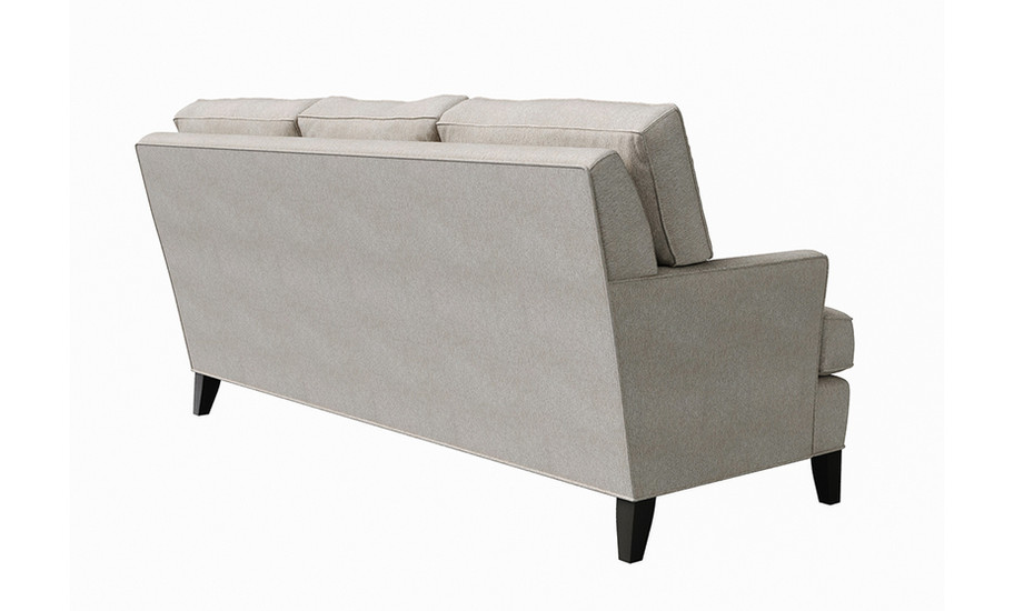 the back view of a beige traditional canadian-made sofa