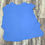 Thumbnail: Vivid cobalt blue Italian leather hide on a wood background