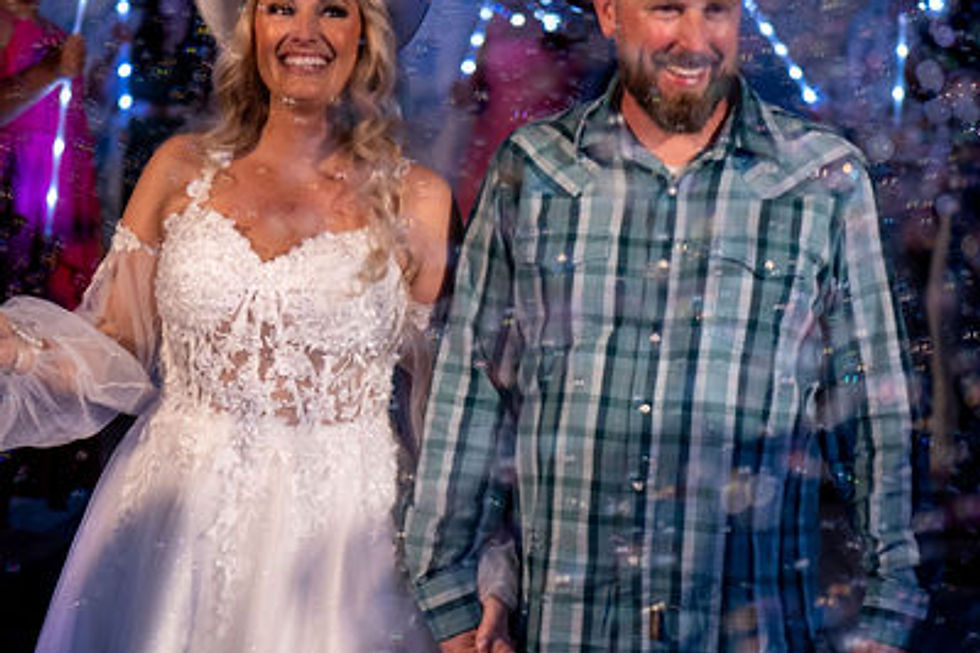 Professional videographer filming a wedding ceremony in Florida
