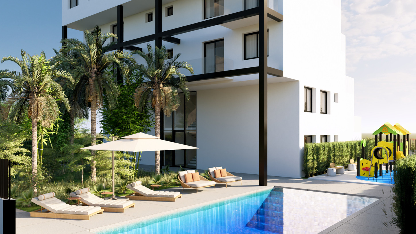 Zonas comunes con piscina en edificio residencial plurifamiliar contemporáneo diseñado por Genovés Calleja Arquitectos.