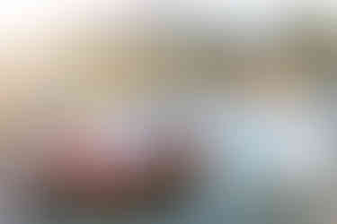 Destination wedding couple celebrating with friends during a Costa del Sol wedding photography session with a vintage car