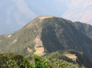 Mountain ridge trail leading toward the Choquequirao ruins overlooking the Apurimac Valley in Peru