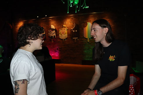 talking in front of art