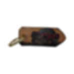 BROWN LEATHER key chain, stamped with monster trucks and 4x4 design.