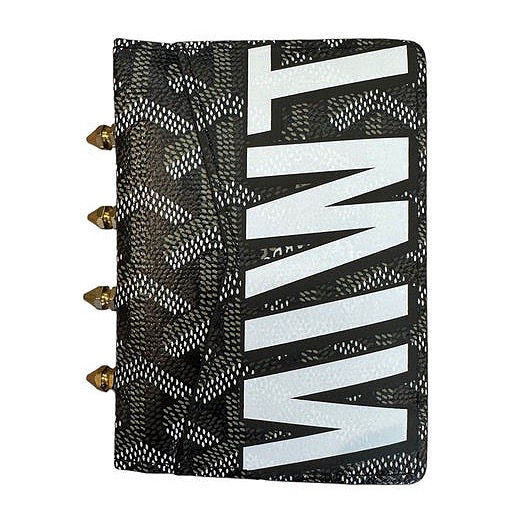 Thumbnail: credit card holder, small wallet with 4 brass studs lining the fold. bold "TWIN" logo printed on front and back.
