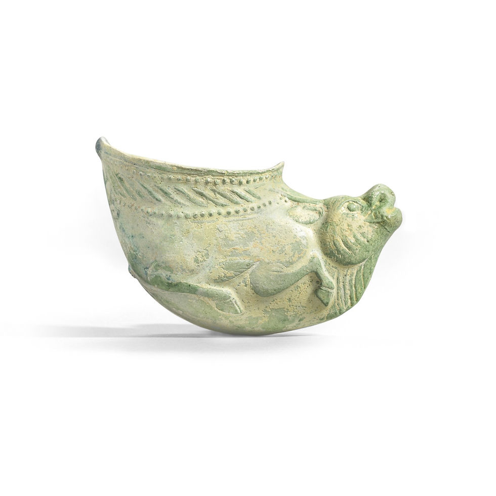 Ancient greenish stone carving with horse and detailed patterns, shaped like a boat, set against a plain white background.
