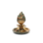 Ancient gold and green ritual object with intricate designs, displayed on a white background. The piece has a conical top and circular base.