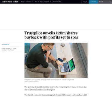 Man viewing laptop, Trustpilot unveils £20m shares buyback with profits set to soar. MARKETING AND CORPORATE.
