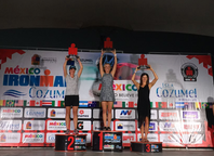 Coach Liza on the Ironman podium