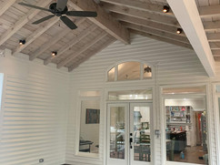 Deck construction with covered roof