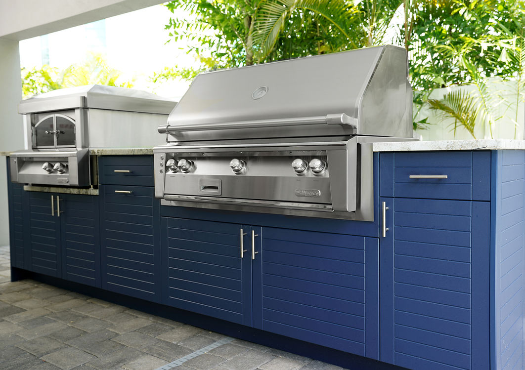 custom outdoor kitchen with stainless steel grill