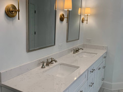 double sink with double mirrors and grey cabinets bathroom renovation