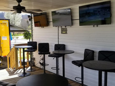 The Appalachian RV Resort Event Space Rental outdoor area with Big Screen TVs