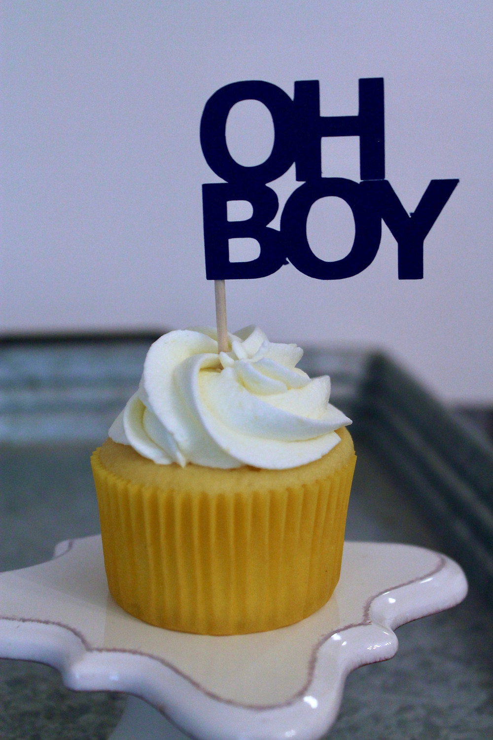 Lemon Buttercream Cupcake with topper