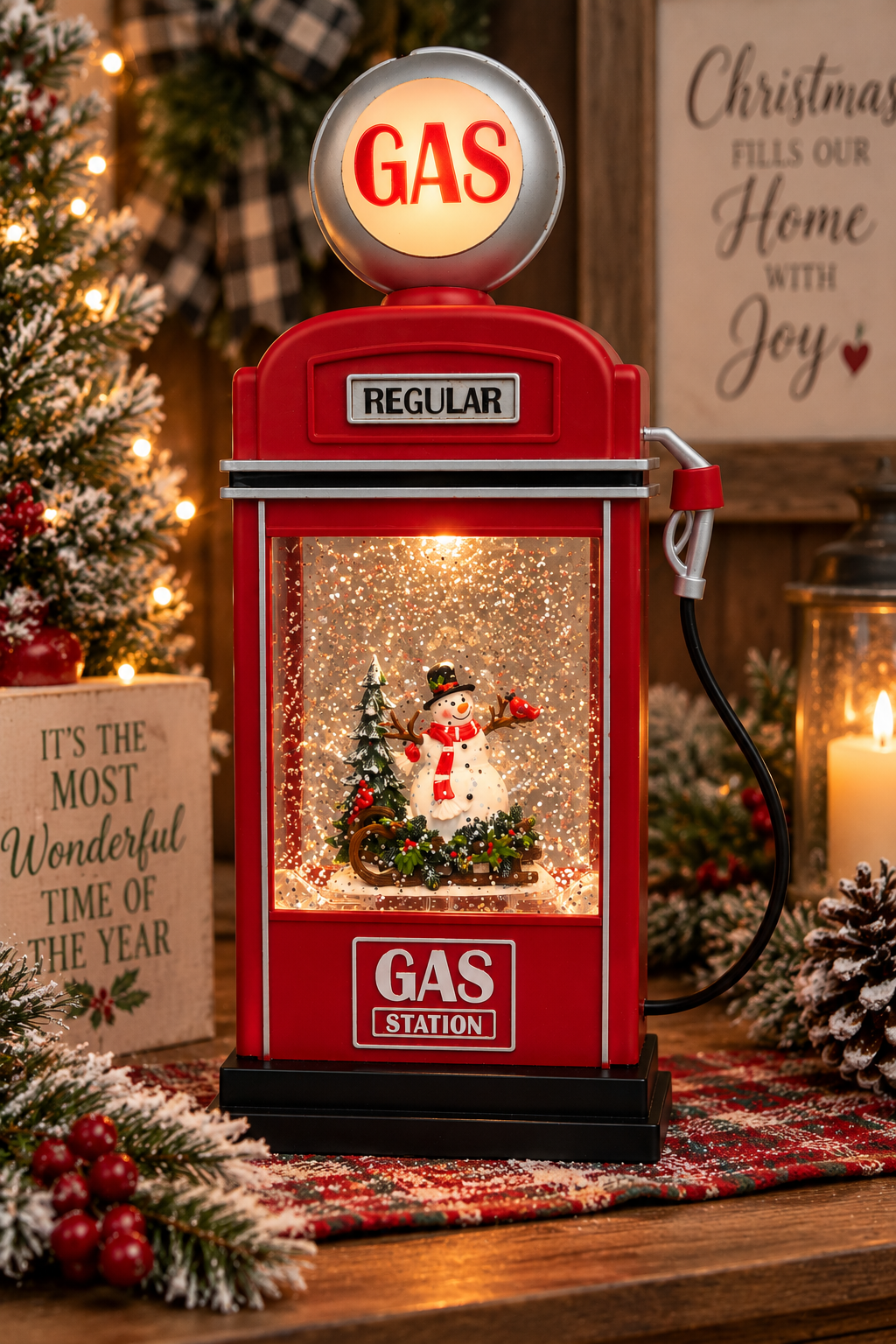 Christmas gas pump snow globe with snowman and swirling glitter