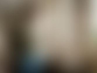 Person measuring window in cozy living room