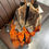 Thumbnail: Women's Vintage Floral - like Patterned Scarf - Elegant Orange & Metallic Accen
