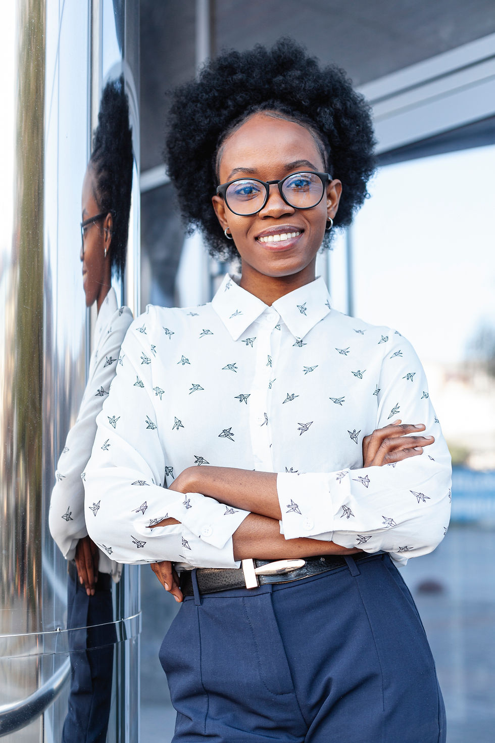 low-angle-modern-womna-with-crossed-arms.jpg