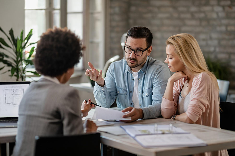 young couple discussing a lease agreement