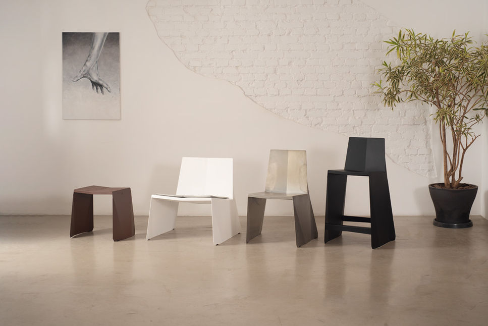 Brown Ori Stool at the start of a line-up with the lounge chair, chair and counter stool