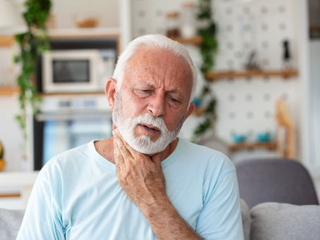 Man with throat pain from strep throat