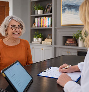 Illustration of a physician reviewing paperwork with a woman during an office consultation