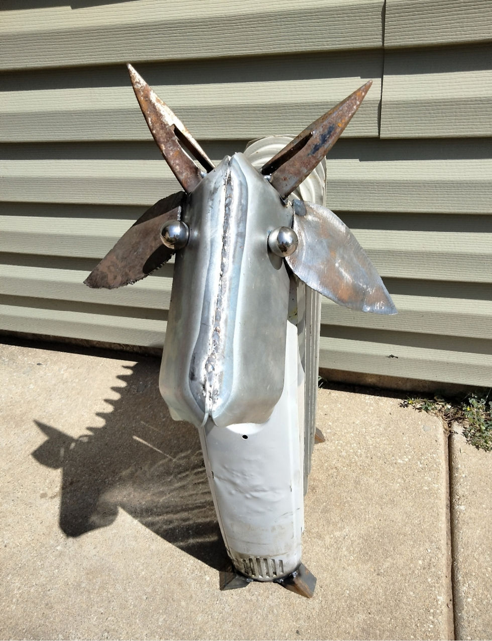 Metal goat sculpture