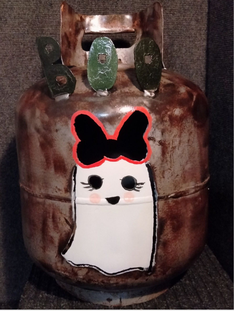 Ghost painted on metal propane tank